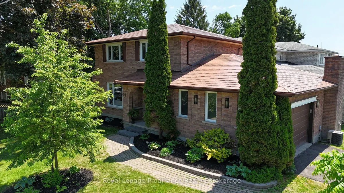 Detached Belleville home with broad garage frontage