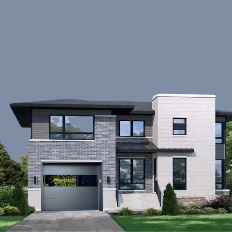 Charcoal glass garage door installed on a modern family home