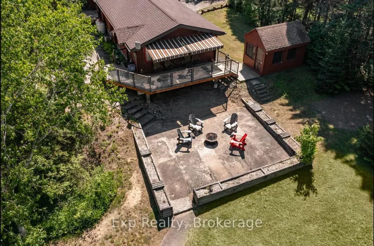Detached Huntsville property with visible garage frontage