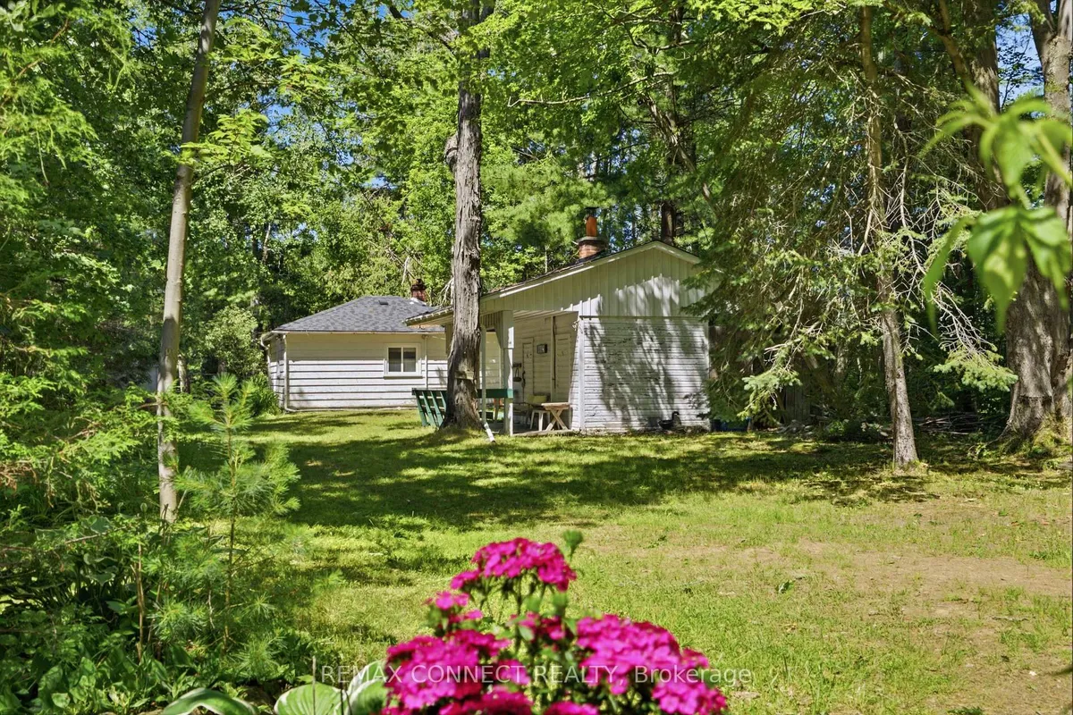 Detached Kawartha Lakes home with front garage on a residential lot