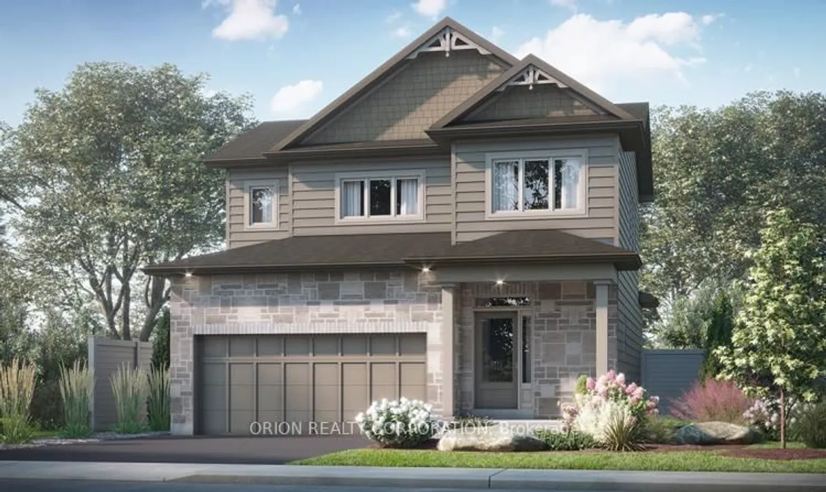 Detached Kingston home with a broad garage-front driveway