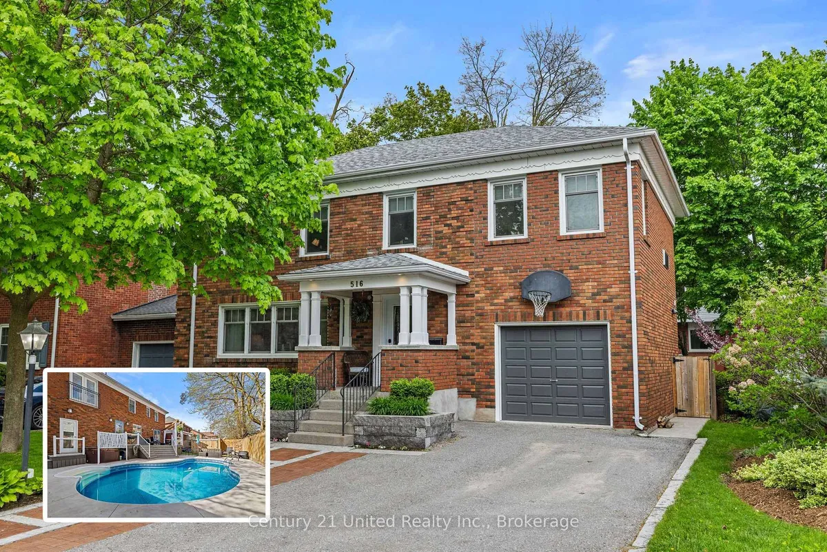 Detached Peterborough home with garage visible from the front drive