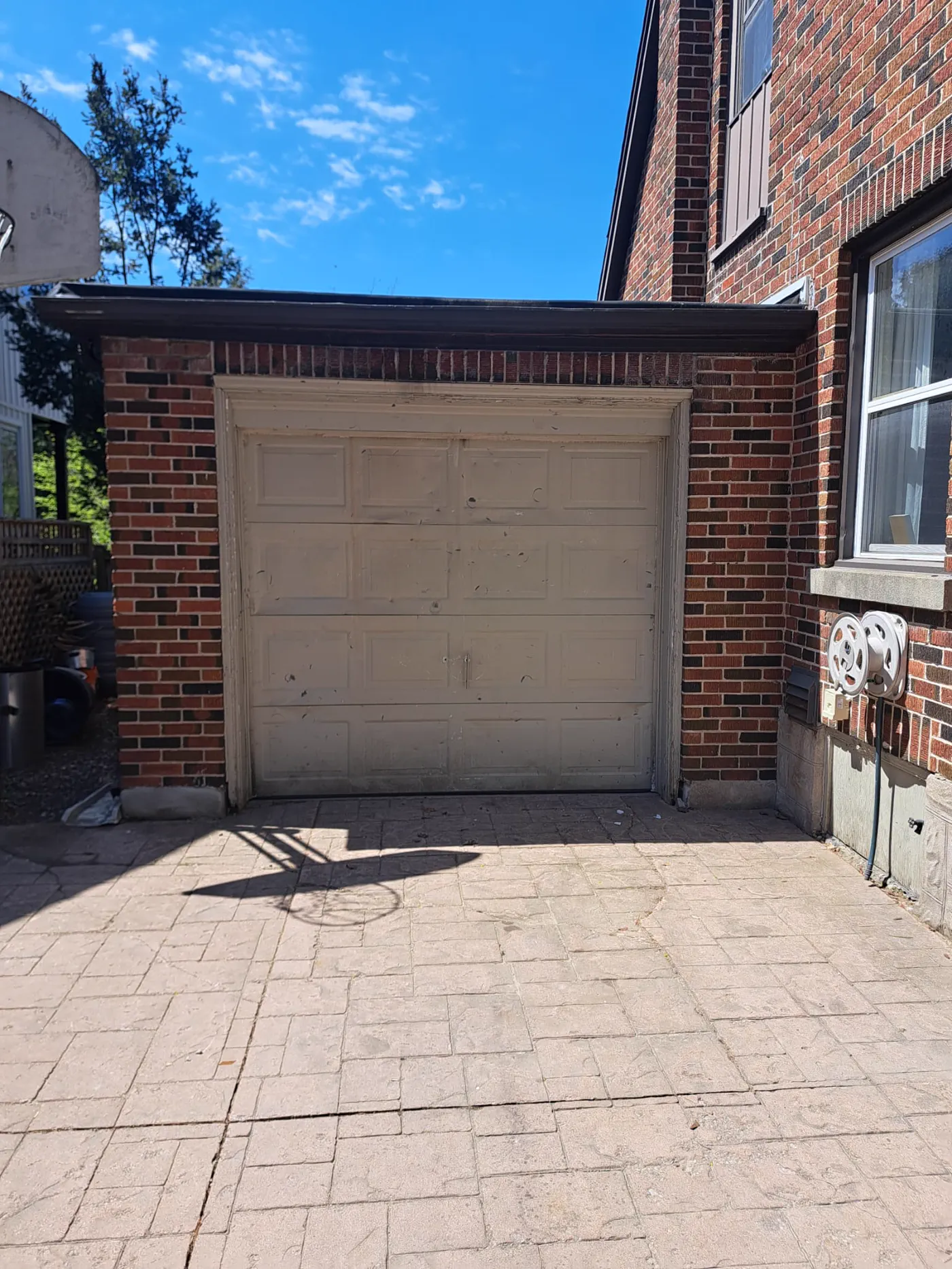 RedOak job archive photo showing garage-door work near aurora