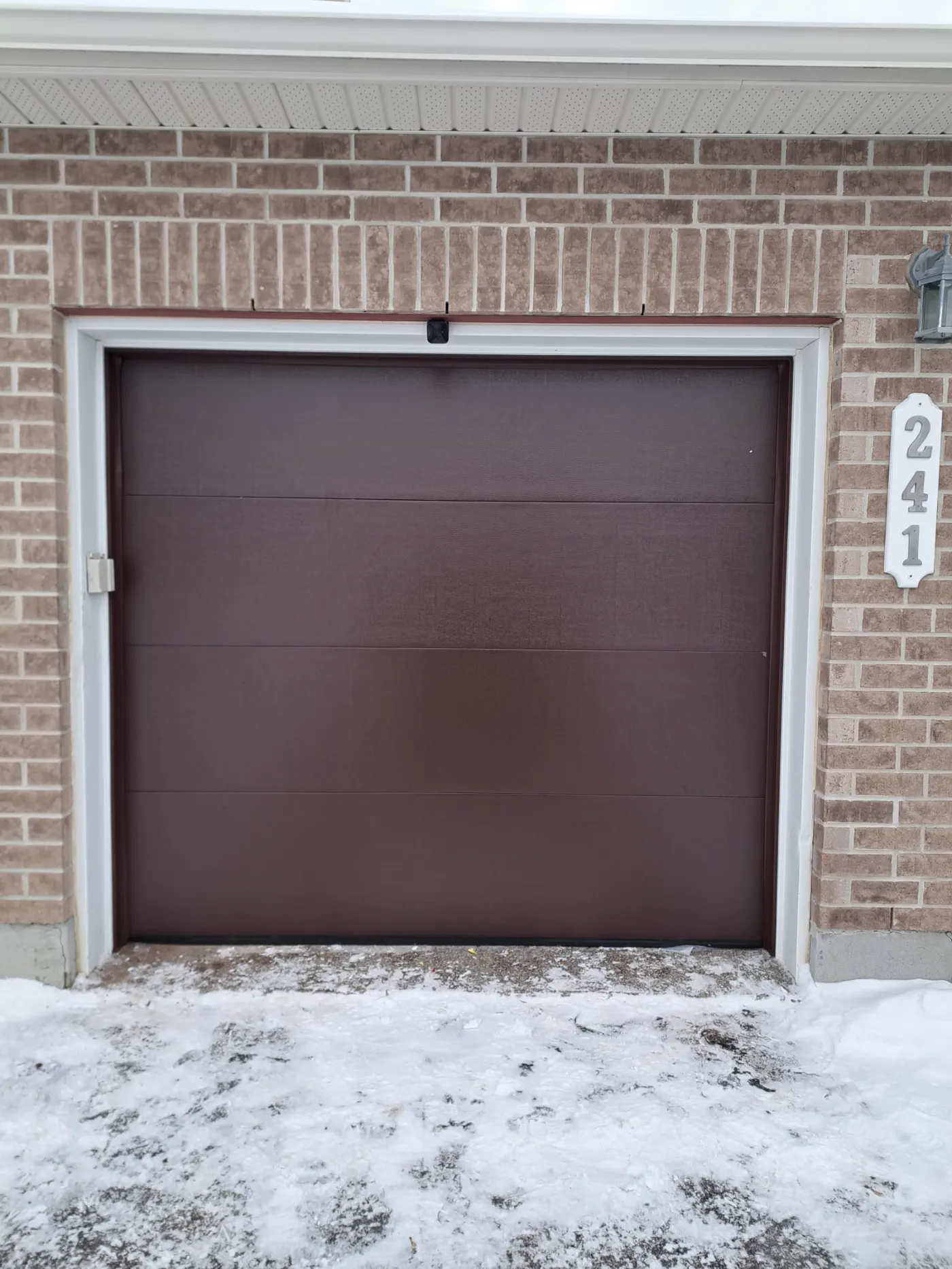 RedOak job archive photo showing garage-door work near east-gwillimbury