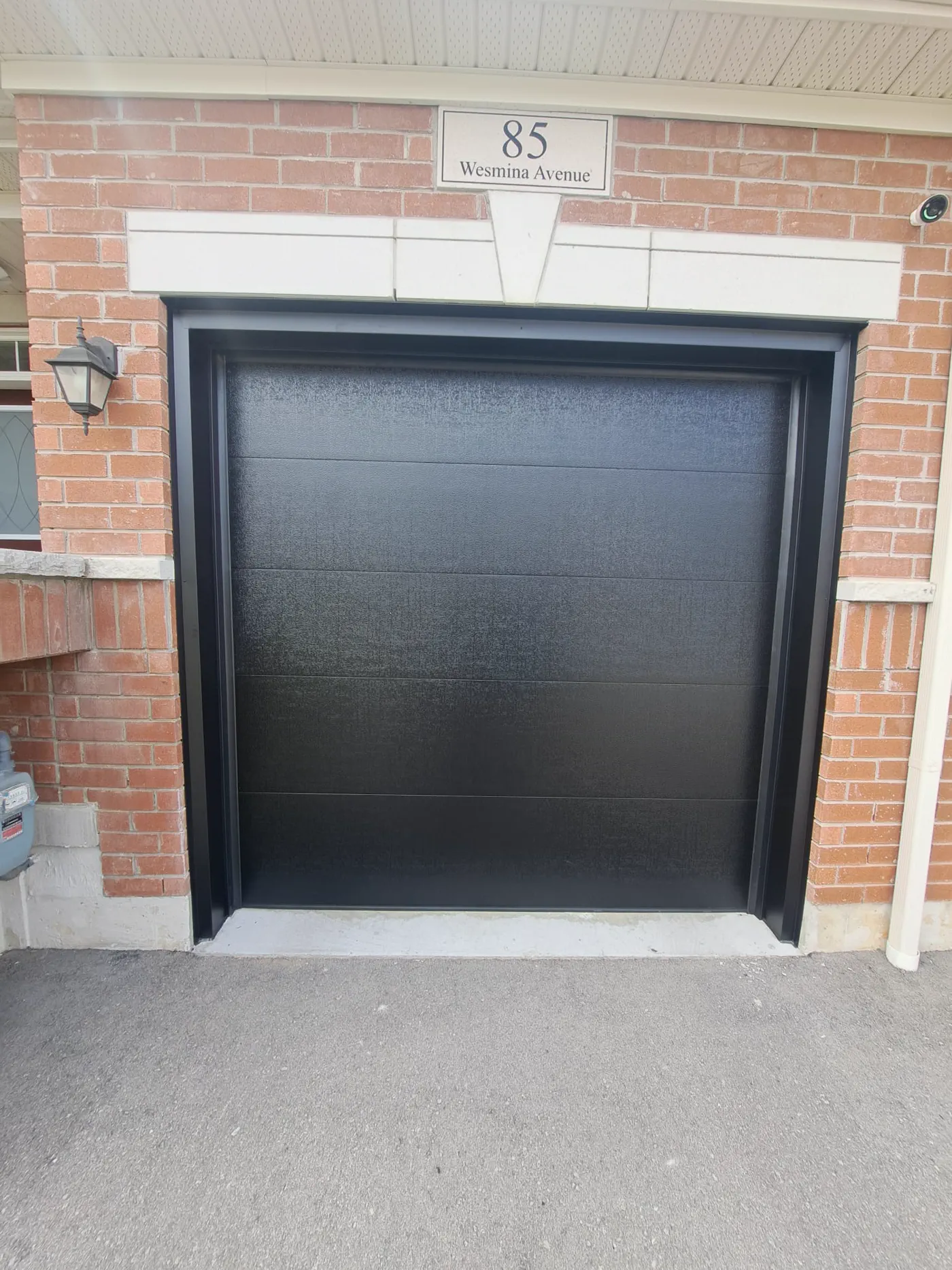 Second RedOak field photo showing garage-door detail near new-tecumseth-alliston