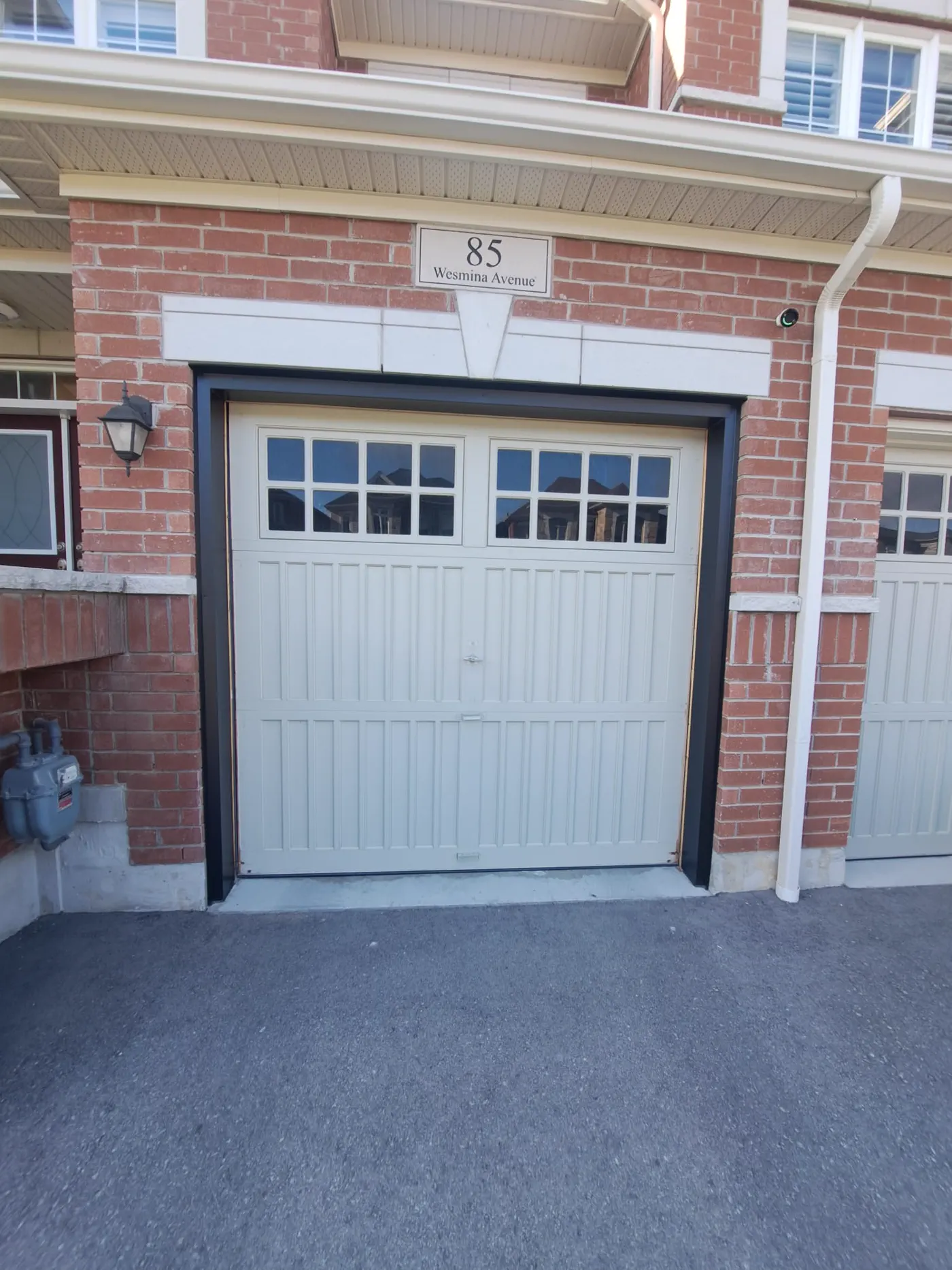 RedOak job archive photo showing garage-door work near stouffville