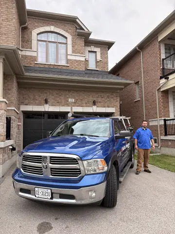 RedOak service truck parked in front of newly installed garage doors